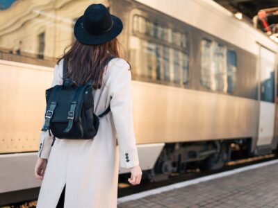 Tourist girl at railway station platform